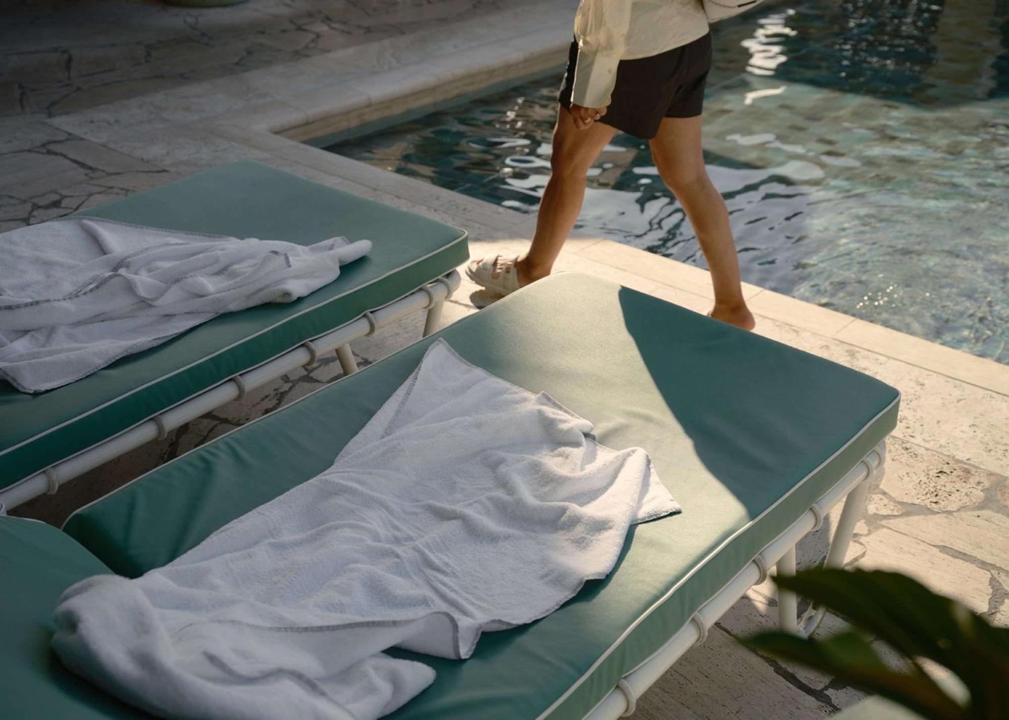 The Calile Hotel Brisbane Exterior photo A poolside chaise longue